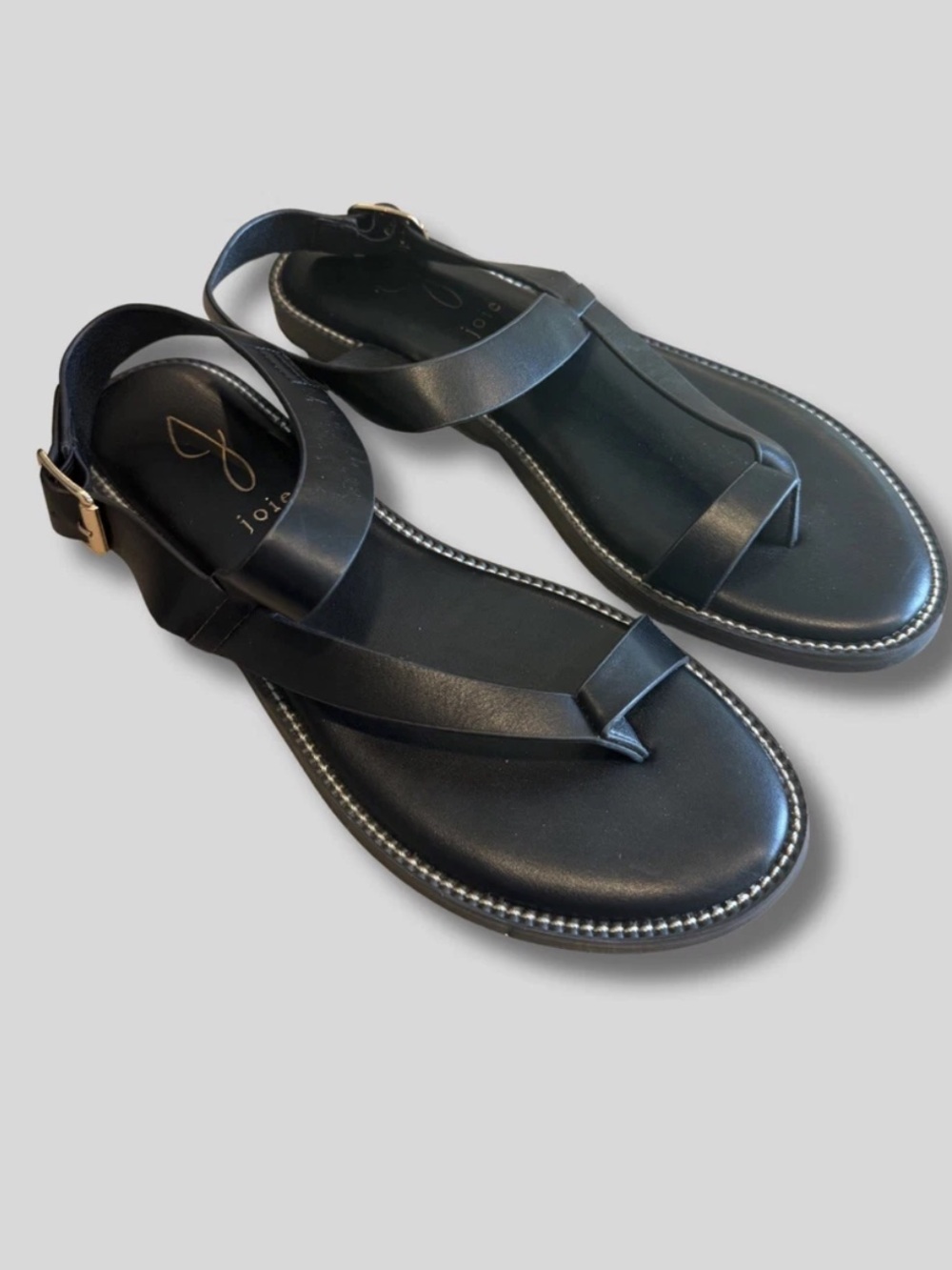 Joe woman’s black buckle leather upper flat sandals